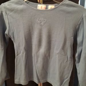 Children’s long sleeve shirt.